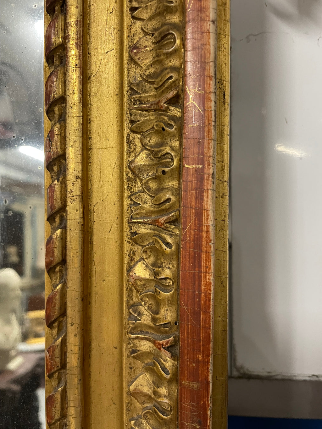 Miroir doré style Louis XVI