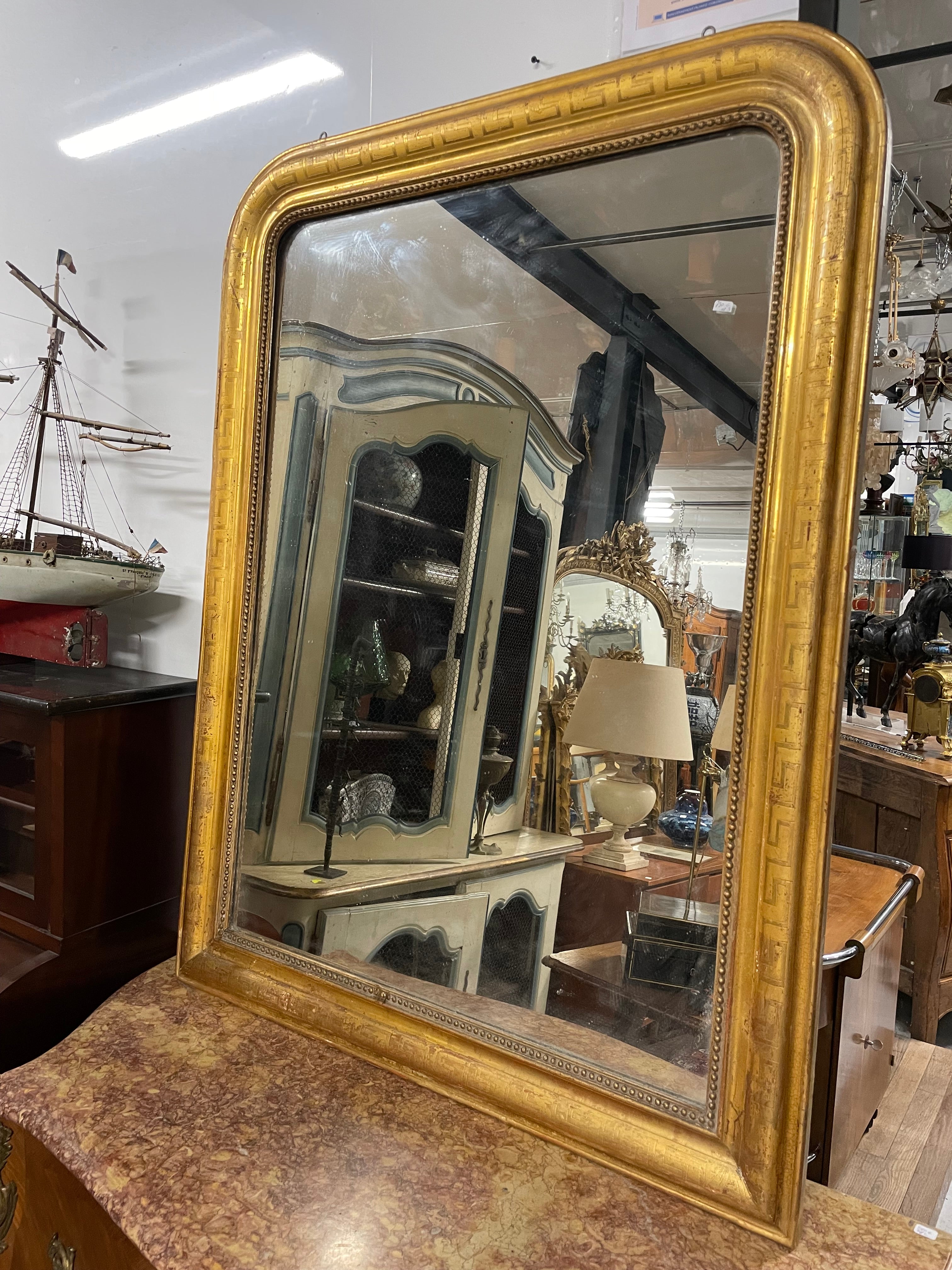 Grand miroir doré Louis Philippe