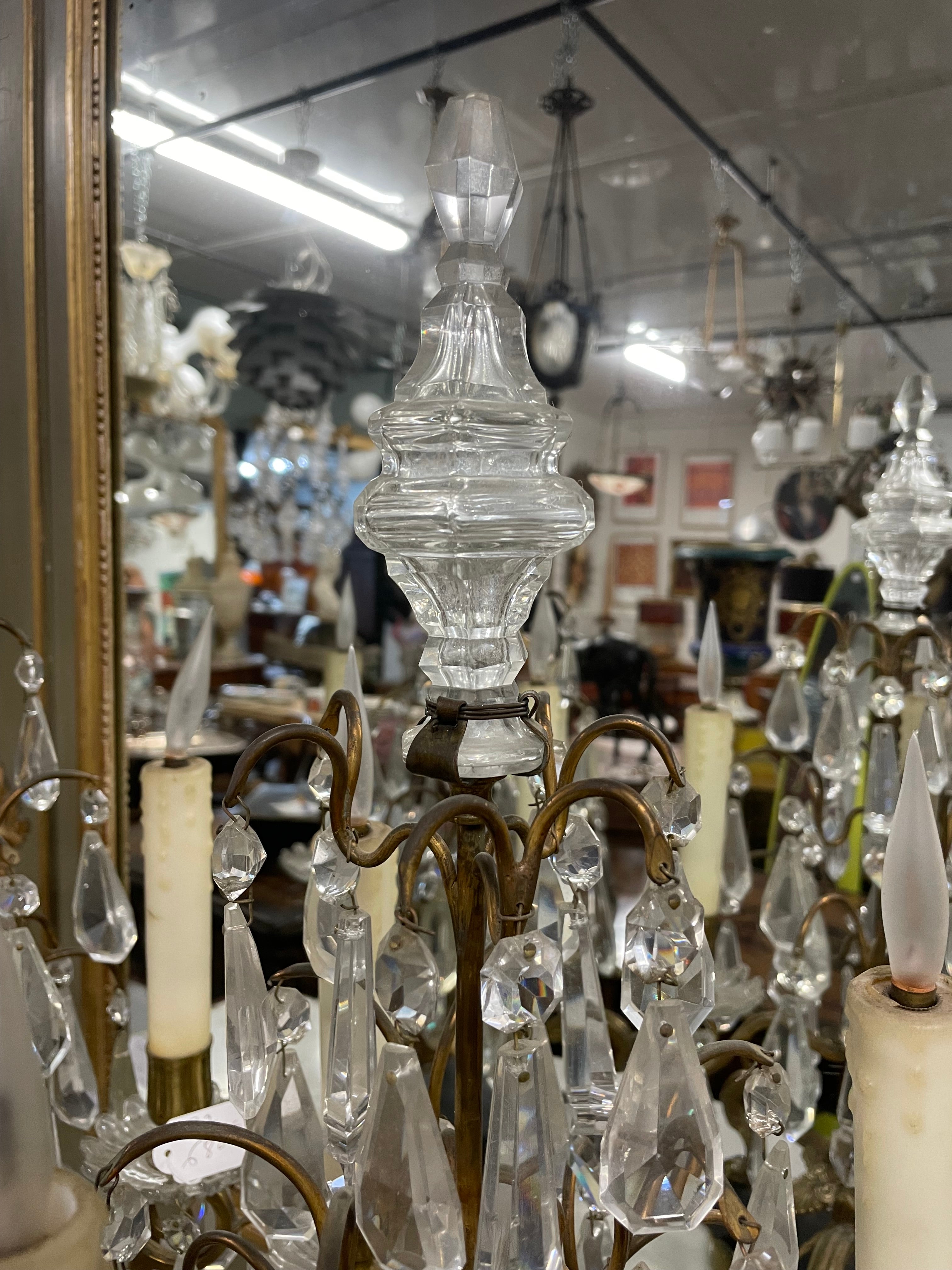 Paire de girandoles en bronze doré et cristal